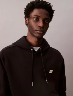 Calvin Klein Jeans Miesten Huppari, LS EU 350Terry Badge Hoodie Musta