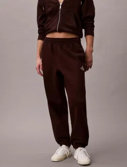 Calvin Klein Jeans naisten collegehousut Monology French Terry Jogger, tummanruskea