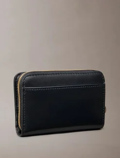 Calvin Klein naisten lompakko CK Medium Flap Zip Around, musta