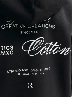 Jack and Jones Junior lasten huppari JJROAR SWEAT HOOD JNR, musta